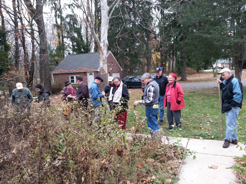 Hikers gather outside the Lawrence Nature Center